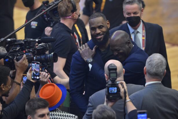 Feb 20, 2022; Cleveland, Ohio, USA; Lebron James and Michael Jordan on court during halftime during the 2022 NBA All-Star Game at Rocket Mortgage FieldHouse. Mandatory Credit: David Richard-USA TODAY Sports
