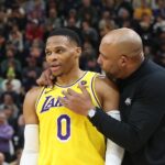 Nov 7, 2022; Salt Lake City, Utah, USA; Los Angeles Lakers head coach Darvin Ham speaks with guard Russell Westbrook (0) against the Utah Jazz in the second quarter at Vivint Arena. Mandatory Credit: Rob Gray-USA TODAY Sports