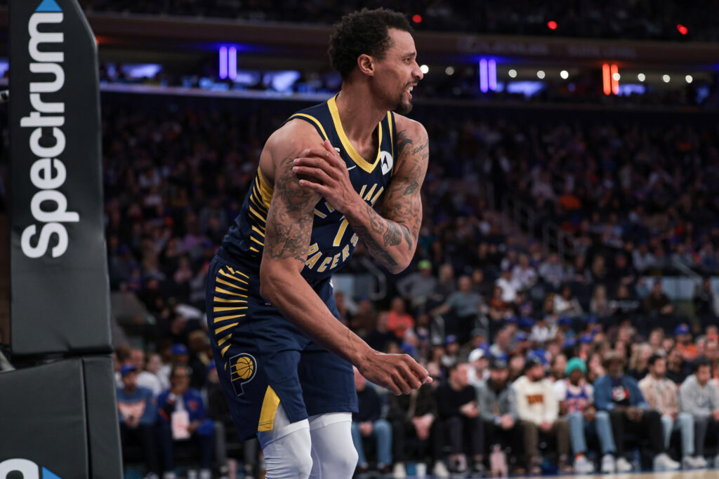Apr 9, 2023; New York, New York, USA; Indiana Pacers guard George Hill (7) holds his shoulder after an injury during the second quarter against the New York Knicks at Madison Square Garden. Mandatory Credit: Vincent Carchietta-Imagn Images