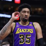 Jan 13, 2024; Salt Lake City, Utah, USA; Los Angeles Lakers forward Christian Wood (35) reacts to a play against the Utah Jazz during the second quarter at Delta Center. Mandatory Credit: Rob Gray-USA TODAY Sports