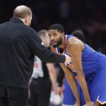 Jan 3, 2025; Oklahoma City, Oklahoma, USA; New York Knicks forward Mikal Bridges (25) talks with head coach Tom Thibodeau during a break in play against the Oklahoma City Thunder during the second quarter at Paycom Center. Mandatory Credit: Alonzo Adams-Imagn Images