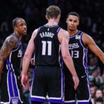 Jan 10, 2025; Boston, Massachusetts, USA; Sacramento Kings forward DeMar DeRozan (10), forward Keegan Murray (13) and forward Domantas Sabonis (11) react after defeating the Boston Celtics at TD Garden. Mandatory Credit: David Butler II-Imagn Images