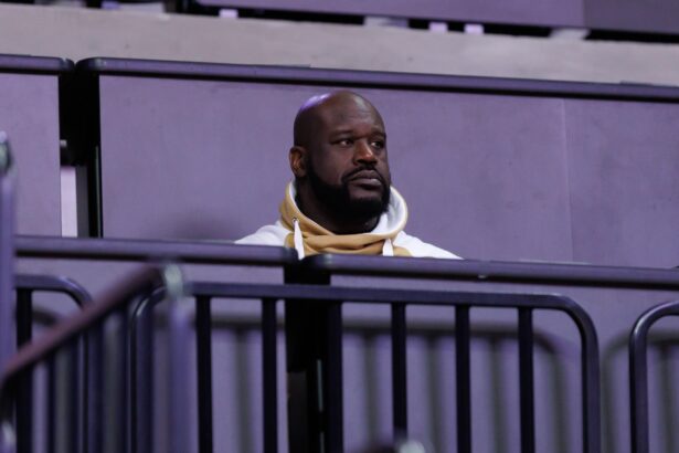 Jan 19, 2025; Gainesville, Florida, USA; Former NBA player Shaquille O'Neal sits courtside during the first half between the Florida Gators and the LSU Tigers at Exactech Arena at the Stephen C. O'Connell Center. Mandatory Credit: Matt Pendleton-Imagn Images