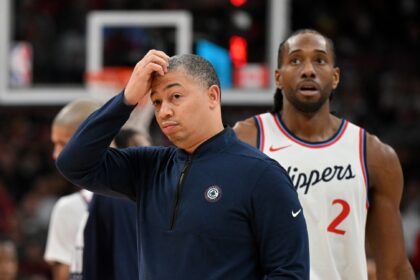 Feb 2, 2025; Toronto, Ontario, CAN; Los Angeles Clippers head coach Tyronn Lue scratches his head after calling a time out as forward Kawhi Leonard (2) walks past in the first half against the Toronto Raptors at Scotiabank Arena. Mandatory Credit: Dan Hamilton-Imagn Images