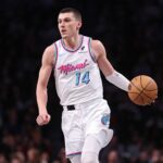 Feb 7, 2025; Brooklyn, New York, USA; Miami Heat guard Tyler Herro (14) dribbles up court during the second half against the Brooklyn Nets at Barclays Center. Mandatory Credit: Vincent Carchietta-Imagn Images