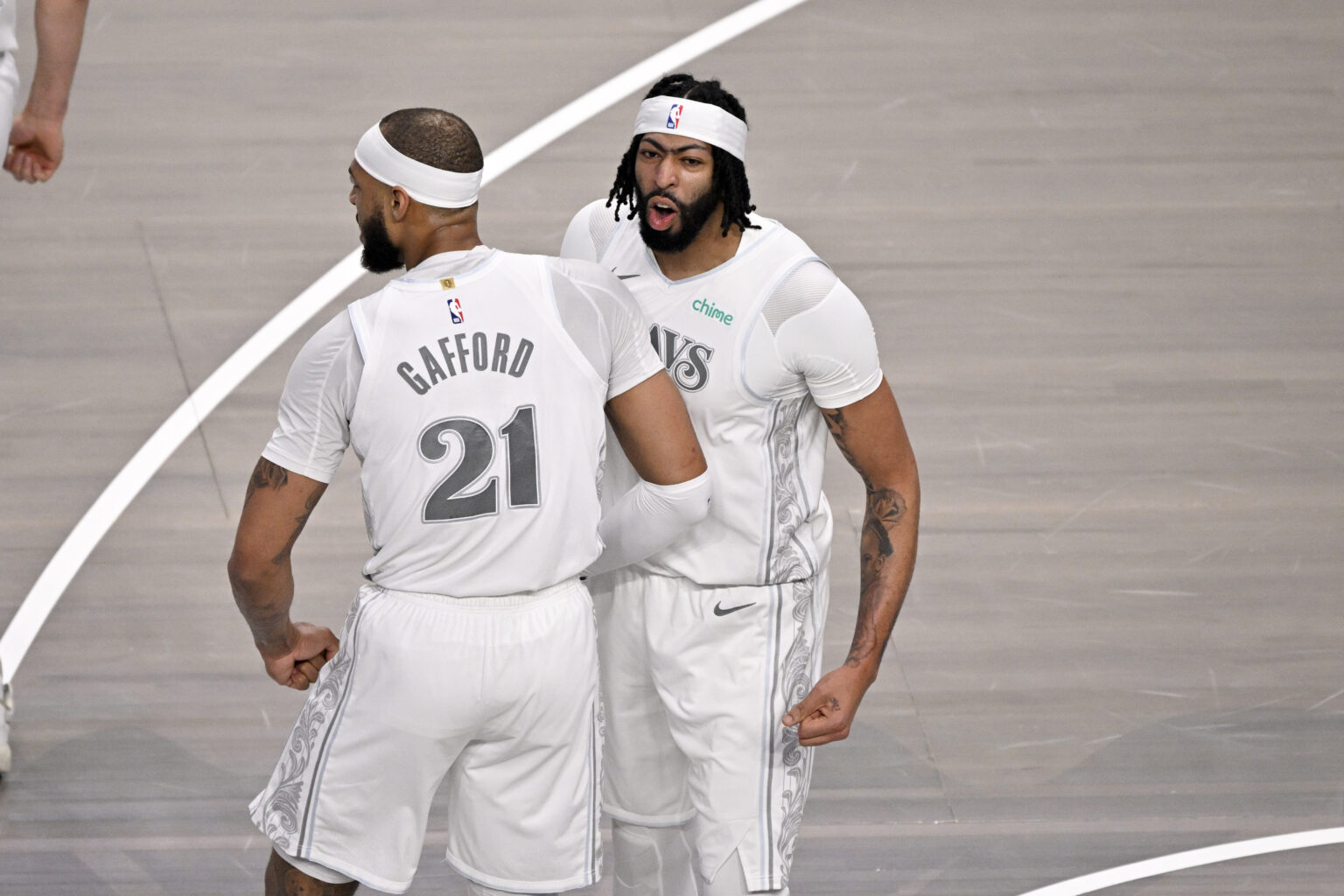 Feb 8, 2025; Dallas, Texas, USA; Dallas Mavericks forward Anthony Davis (3) and center Daniel Gafford (21) celebrates after Davis dunks the ball during the game between the Dallas Mavericks and the Houston Rockets at the American Airlines Center. Mandatory Credit: Jerome Miron-Imagn Images