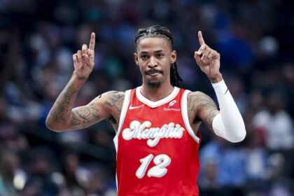 Mar 7, 2025; Dallas, Texas, USA; Memphis Grizzlies guard Ja Morant (12) reacts during the first quarter against the Dallas Mavericks at American Airlines Center. Mandatory Credit: Kevin Jairaj-Imagn Images
