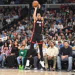 Mar 15, 2025; Memphis, Tennessee, USA; Miami Heat point guard Tyler Herro (14) shoots a wide open three-point shot in the first quarter of the game against the Memphis Grizzlies at FedExForum. Mandatory Credit: Matthew Smith-Imagn Images