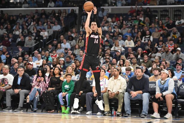 Mar 15, 2025; Memphis, Tennessee, USA; Miami Heat point guard Tyler Herro (14) shoots a wide open three-point shot in the first quarter of the game against the Memphis Grizzlies at FedExForum. Mandatory Credit: Matthew Smith-Imagn Images