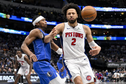 Mar 21, 2025; Dallas, Texas, USA; Dallas Mavericks guard Brandon Williams (10) knocks the ball away from Detroit Pistons guard Cade Cunningham (2) during the second half at the American Airlines Center. Mandatory Credit: Jerome Miron-Imagn Images