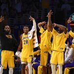 Apr 11, 2025; Los Angeles, California, USA; Los Angeles Lakers forward Jarred Vanderbilt (2), forward LeBron James (23), forward Rui Hachimura (28), center Jaxson Hayes (11), and Los Angeles Lakers guard Gabe Vincent (7) celebrate after scoring against the Houston Rockets during the second half at Crypto.com Arena. Mandatory Credit: Jonathan Hui-Imagn Images