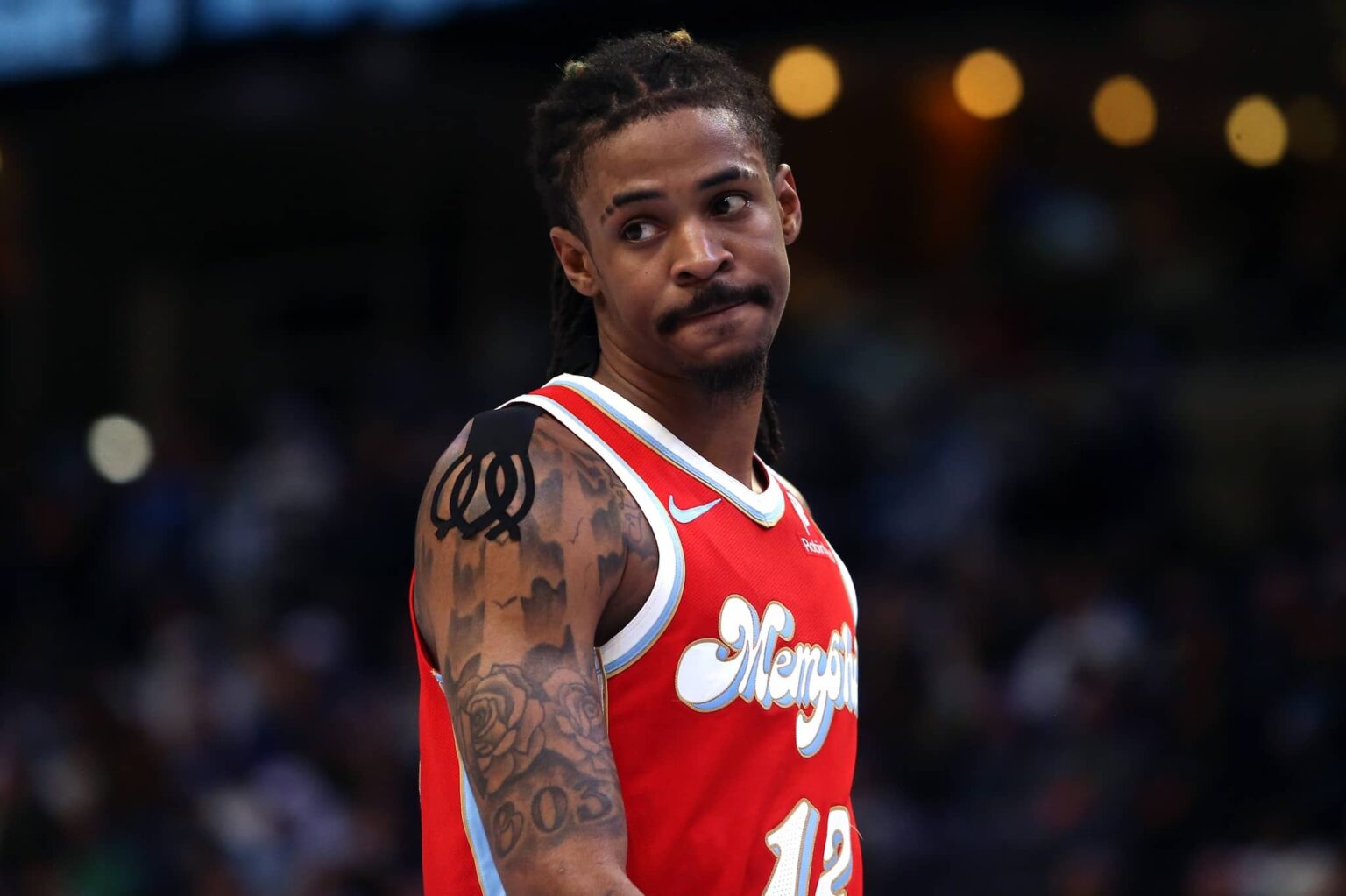 Memphis Grizzlies guard Ja Morant (12) looks on during the fourth quarter against the Golden State Warriors at FedExForum.
