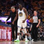 Apr 15, 2025; San Francisco, California, USA; Golden State Warriors forward Draymond Green (23) walks towards the team bench with head coach Steve Kerr after a play against the Memphis Grizzlies in the third quarter at the Chase Center. Mandatory Credit: Cary Edmondson-Imagn Images