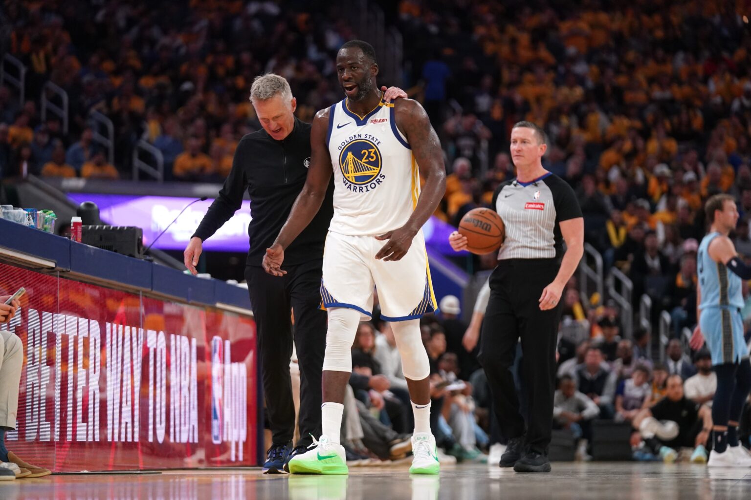 Apr 15, 2025; San Francisco, California, USA; Golden State Warriors forward Draymond Green (23) walks towards the team bench with head coach Steve Kerr after a play against the Memphis Grizzlies in the third quarter at the Chase Center. Mandatory Credit: Cary Edmondson-Imagn Images