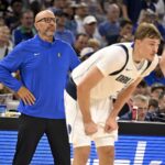 Oct 6, 2025; Fort Worth, Texas, USA; Dallas Mavericks Head Coach Jason Kidd watches forward Cooper Flagg (32) on the court during the second quarter against the Oklahoma City Thunder at Dickie's Arena. Mandatory Credit: Jerome Miron-Imagn Images