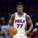 Oct 17, 2025; Philadelphia, Pennsylvania, USA; Philadelphia 76ers guard Vj Edgecombe (77) dribbles the ball against the Minnesota Timberwolves during the third quarter at Xfinity Mobile Arena. Mandatory Credit: Bill Streicher-Imagn Images