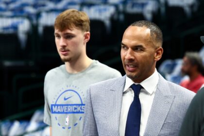 Oct 22, 2025; Dallas, Texas, USA; Dallas Mavericks general manager Nico Harrison and Dallas Mavericks forward Cooper Flagg (32) before the game against the San Antonio Spurs at American Airlines Center. Mandatory Credit: Kevin Jairaj-Imagn Images