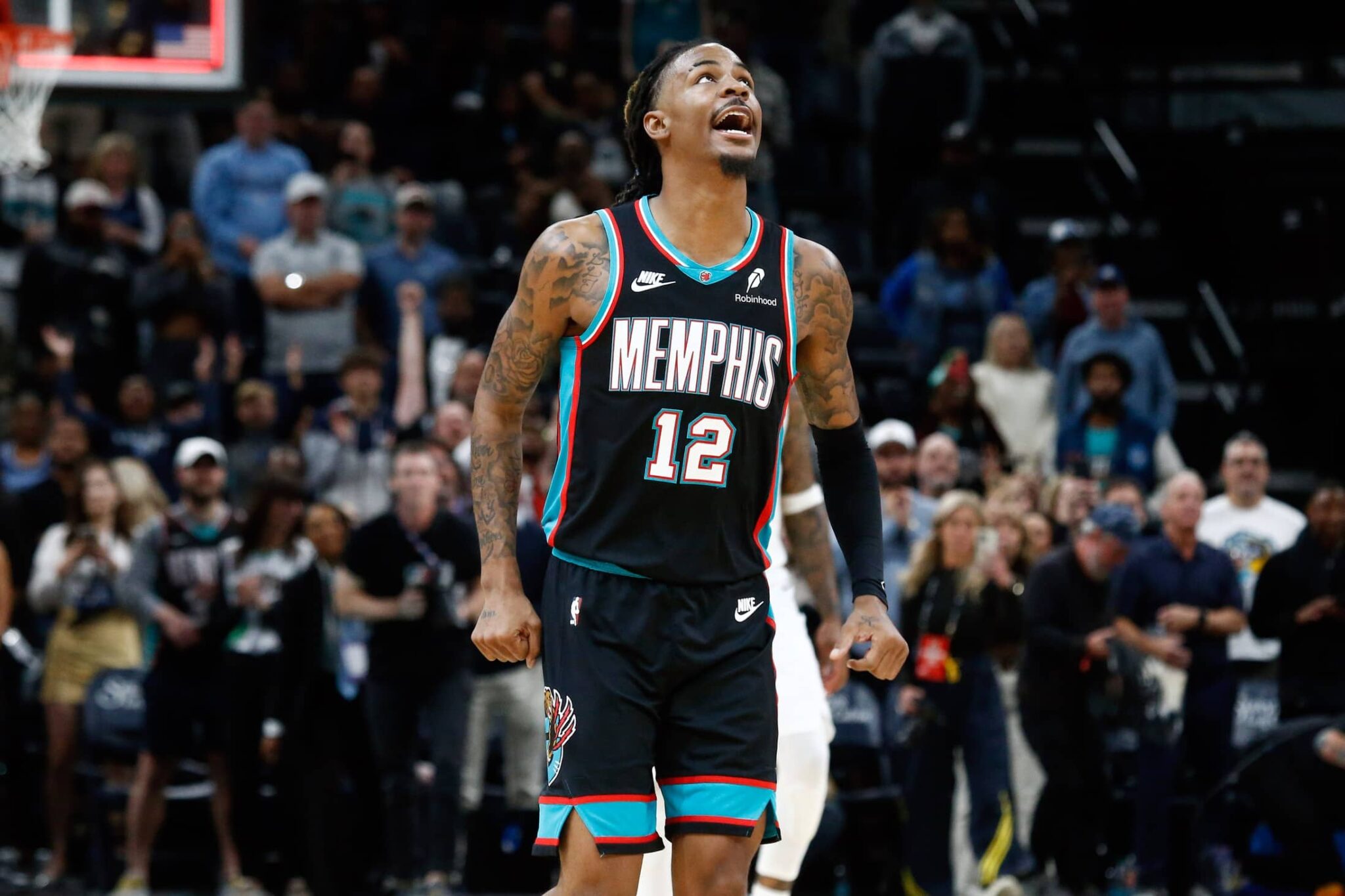 Oct 22, 2025; Memphis, Tennessee, USA; Memphis Grizzlies guard Ja Morant (12) reacts after defeating the New Orleans Pelicans at FedExForum. Mandatory Credit: Petre Thomas-Imagn Images