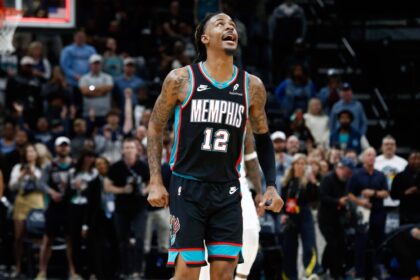 Oct 22, 2025; Memphis, Tennessee, USA; Memphis Grizzlies guard Ja Morant (12) reacts after defeating the New Orleans Pelicans at FedExForum. Mandatory Credit: Petre Thomas-Imagn Images