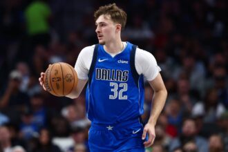 Oct 24, 2025; Dallas, Texas, USA; Dallas Mavericks forward Cooper Flagg (32) dribbles during the first quarter against the Washington Wizards at American Airlines Center. Mandatory Credit: Kevin Jairaj-Imagn Image