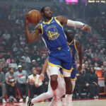 Oct 24, 2025; Portland, Oregon, USA; Golden State Warriors forward Jonathan Kuminga (1) passes the ball against the Portland Trail Blazers in the first half at Moda Center. Mandatory Credit: Jaime Valdez-Imagn Images