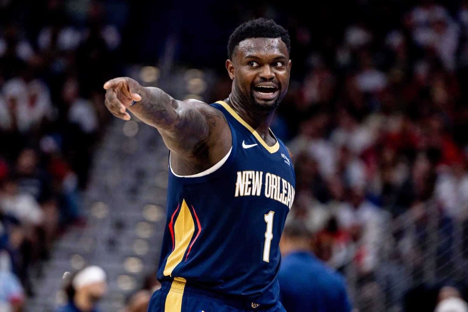 Oct 24, 2025; New Orleans, Louisiana, USA; New Orleans Pelicans forward Zion Williamson (1) reacts to a play against the San Antonio Spurs during the second half at Smoothie King Center. Mandatory Credit: Stephen Lew-Imagn Images