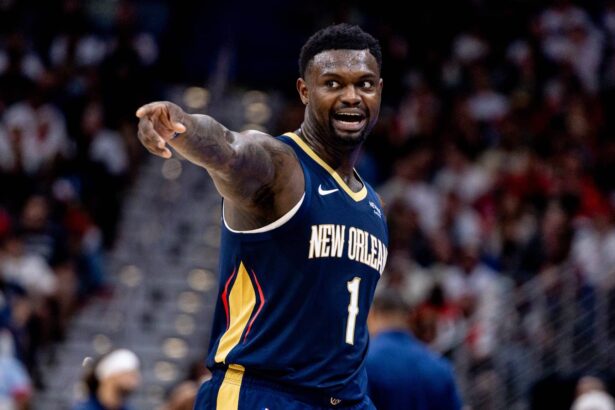 Oct 24, 2025; New Orleans, Louisiana, USA; New Orleans Pelicans forward Zion Williamson (1) reacts to a play against the San Antonio Spurs during the second half at Smoothie King Center. Mandatory Credit: Stephen Lew-Imagn Images