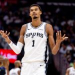 Oct 24, 2025; New Orleans, Louisiana, USA; San Antonio Spurs forward/center Victor Wembanyama (1) reacts to being fouled by New Orleans Pelicans center Derik Queen (not pictured) during the second half at Smoothie King Center. Mandatory Credit: Stephen Lew-Imagn Images
