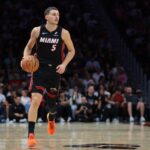 Oct 26, 2025; Miami, Florida, USA; Miami Heat forward Nikola Jovic (5) dribbles the basketball against the New York Knicks during the second quarter at Kaseya Center. Mandatory Credit: Sam Navarro-Imagn Images