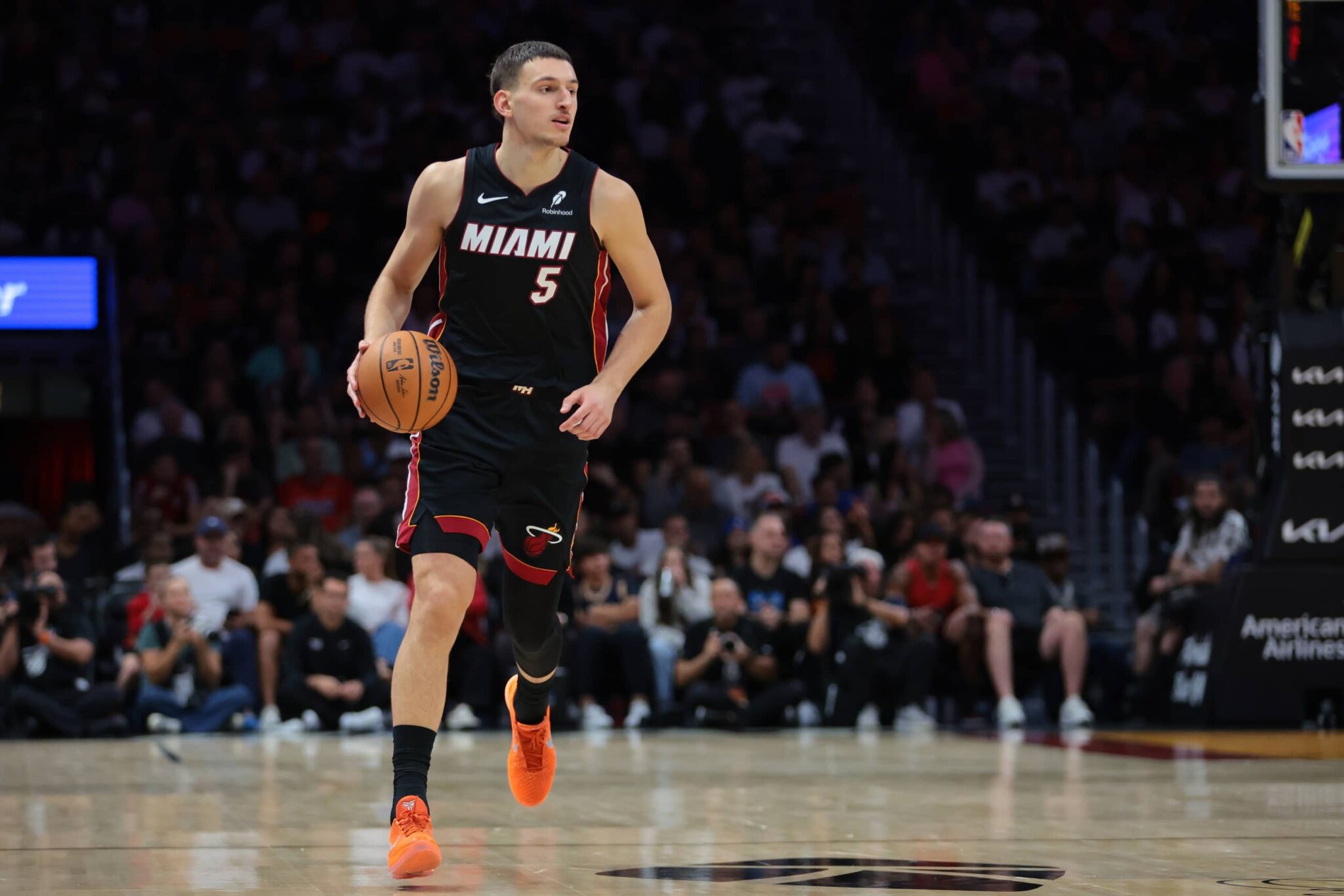 Oct 26, 2025; Miami, Florida, USA; Miami Heat forward Nikola Jovic (5) dribbles the basketball against the New York Knicks during the second quarter at Kaseya Center. Mandatory Credit: Sam Navarro-Imagn Images
