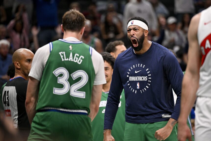 Oct 26, 2025; Dallas, Texas, USA; Dallas Mavericks forward Cooper Flagg (32) and forward Anthony Davis (3) celebrates after Flagg dunks the ball against the Toronto Raptors during the third quarter at the American Airlines Center. Mandatory Credit: Jerome Miron-Imagn Images