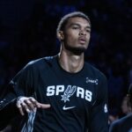 Oct 27, 2025; San Antonio, Texas, USA; San Antonio Spurs forward/center Victor Wembanyama (1) is introduced before the game against the Toronto Raptors at Frost Bank Center. Mandatory Credit: Daniel Dunn-Imagn Images