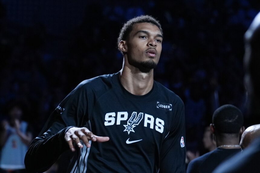 Oct 27, 2025; San Antonio, Texas, USA; San Antonio Spurs forward/center Victor Wembanyama (1) is introduced before the game against the Toronto Raptors at Frost Bank Center. Mandatory Credit: Daniel Dunn-Imagn Images