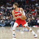 Oct 27, 2025; Chicago, Illinois, USA; Atlanta Hawks guard Trae Young (11) looks to pass the ball against the Chicago Bulls during the second half at United Center. Mandatory Credit: Kamil Krzaczynski-Imagn Images