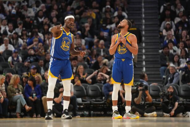 Oct 27, 2025; San Francisco, California, USA; Golden State Warriors forward Jimmy Butler III (10) talks with guard Stephen Curry (30) during a break in the action against the Memphis Grizzlies in the third quarter at the Chase Center. Mandatory Credit: Cary Edmondson-Imagn Images