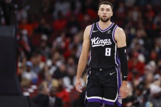 Oct 29, 2025; Chicago, Illinois, USA; Sacramento Kings guard Zach LaVine (8) walks on the court during the first half at United Center. Mandatory Credit: Kamil Krzaczynski-Imagn Images