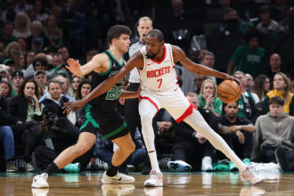 Nov 1, 2025; Boston, Massachusetts, USA; Boston Celtics forward Hugo Gonzalez (28) defends Houston Rockets forward Kevin Durant (7) during the first half at TD Garden. Mandatory Credit: Paul Rutherford-Imagn Images