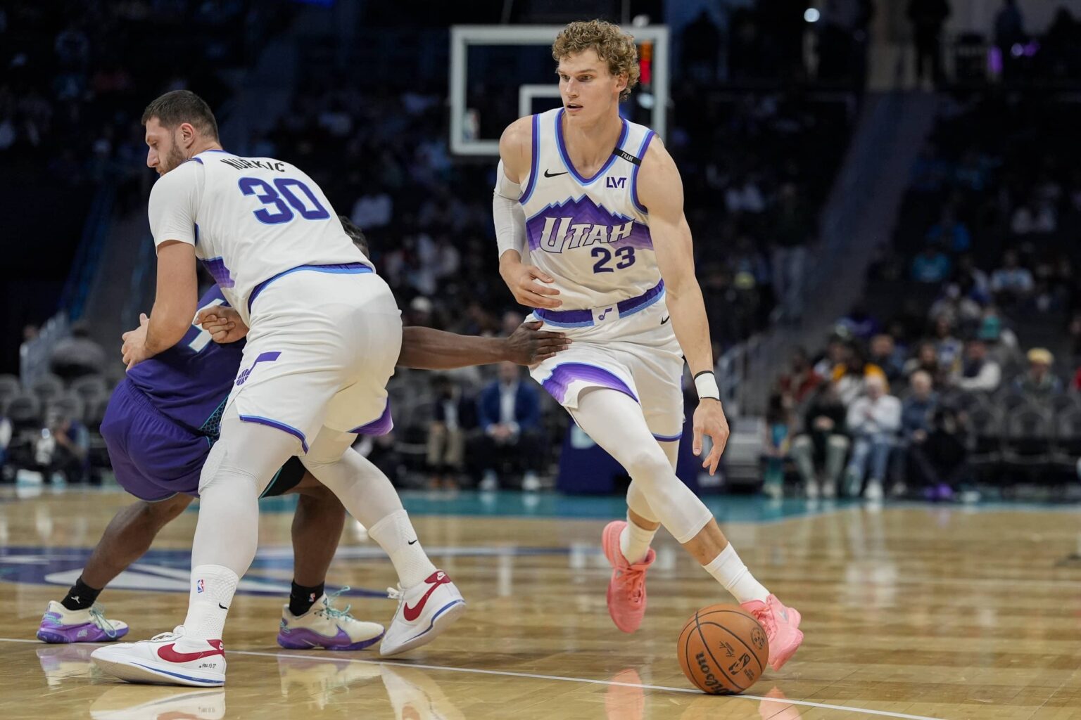 Nov 2, 2025; Charlotte, North Carolina, USA; Utah Jazz forward Lauri Markkanen (23) handles the ball against the Charlotte Hornets during the second half at Spectrum Center. Mandatory Credit: Jim Dedmon-Imagn Images