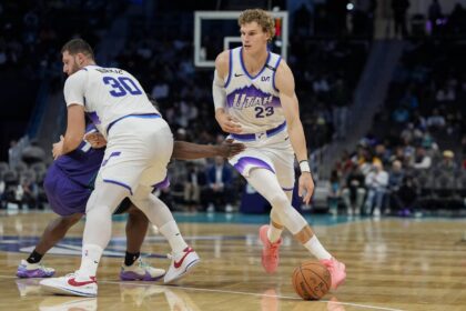 Nov 2, 2025; Charlotte, North Carolina, USA; Utah Jazz forward Lauri Markkanen (23) handles the ball against the Charlotte Hornets during the second half at Spectrum Center. Mandatory Credit: Jim Dedmon-Imagn Images