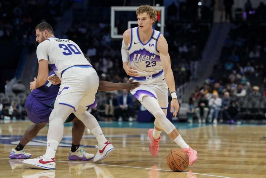 Nov 2, 2025; Charlotte, North Carolina, USA; Utah Jazz forward Lauri Markkanen (23) handles the ball against the Charlotte Hornets during the second half at Spectrum Center. Mandatory Credit: Jim Dedmon-Imagn Images