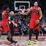 Nov 2, 2025; Toronto, Ontario, CAN; Toronto Raptors forward Scottie Barnes (4) celebrates a play with guard Jamal Shead (23) against the Memphis Grizzlies during the fourth quarter at Scotiabank Arena. Mandatory Credit: Nick Turchiaro-Imagn Images
