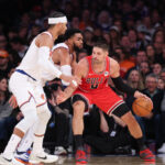 Nov 2, 2025; New York, New York, USA; Chicago Bulls center Nikola Vucevic (9) dribbles against New York Knicks center Karl-Anthony Towns (32) during the second half at Madison Square Garden. Mandatory Credit: Vincent Carchietta-Imagn Images