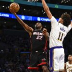 Nov 2, 2025; Los Angeles, California, USA; Miami Heat forward Andrew Wiggins (22) shoots a layup against Los Angeles Lakers center Jaxson Hayes (11) during the first half at Crypto.com Arena. Mandatory Credit: Jonathan Hui-Imagn Images