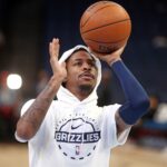 Nov 3, 2025; Memphis, Tennessee, USA; Memphis Grizzlies guard Ja Morant (12) shoots during warm ups prior to the game against the Detroit Pistons at FedExForum. Mandatory Credit: Petre Thomas-Imagn Images