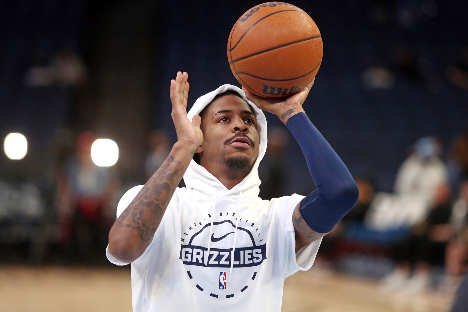 Nov 3, 2025; Memphis, Tennessee, USA; Memphis Grizzlies guard Ja Morant (12) shoots during warm ups prior to the game against the Detroit Pistons at FedExForum. Mandatory Credit: Petre Thomas-Imagn Images