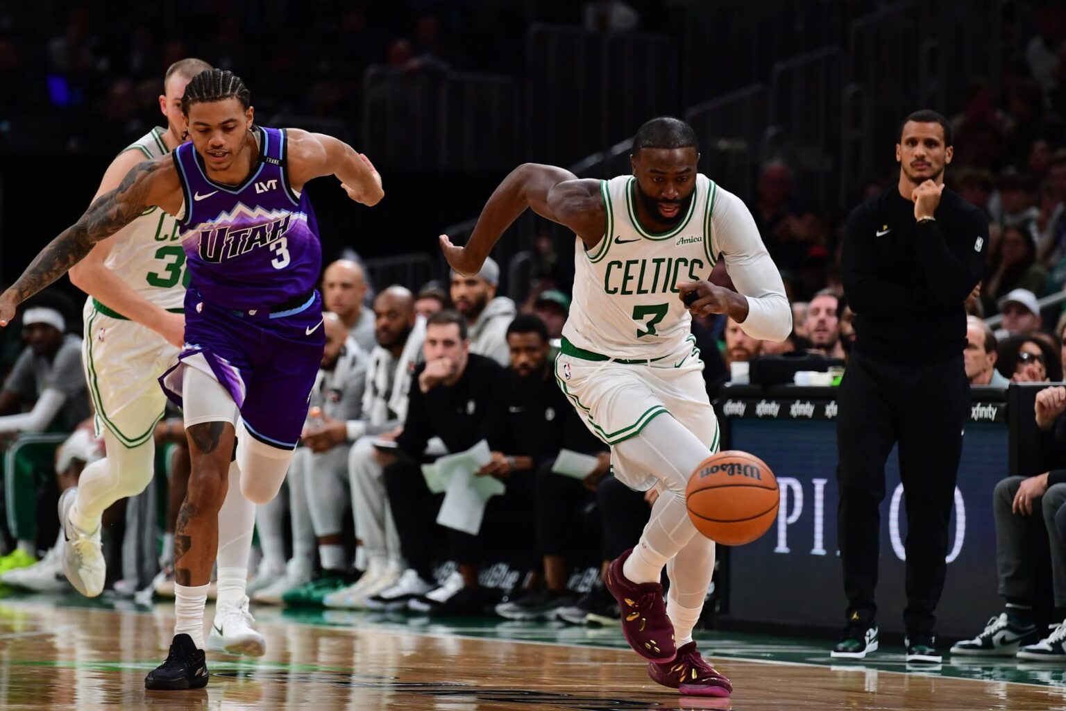 Nov 3, 2025; Boston, Massachusetts, USA; Boston Celtics guard Jaylen Brown (7) chases after a loose ball during the first half against the Utah Jazz at TD Garden. Mandatory Credit: Bob DeChiara-Imagn Images