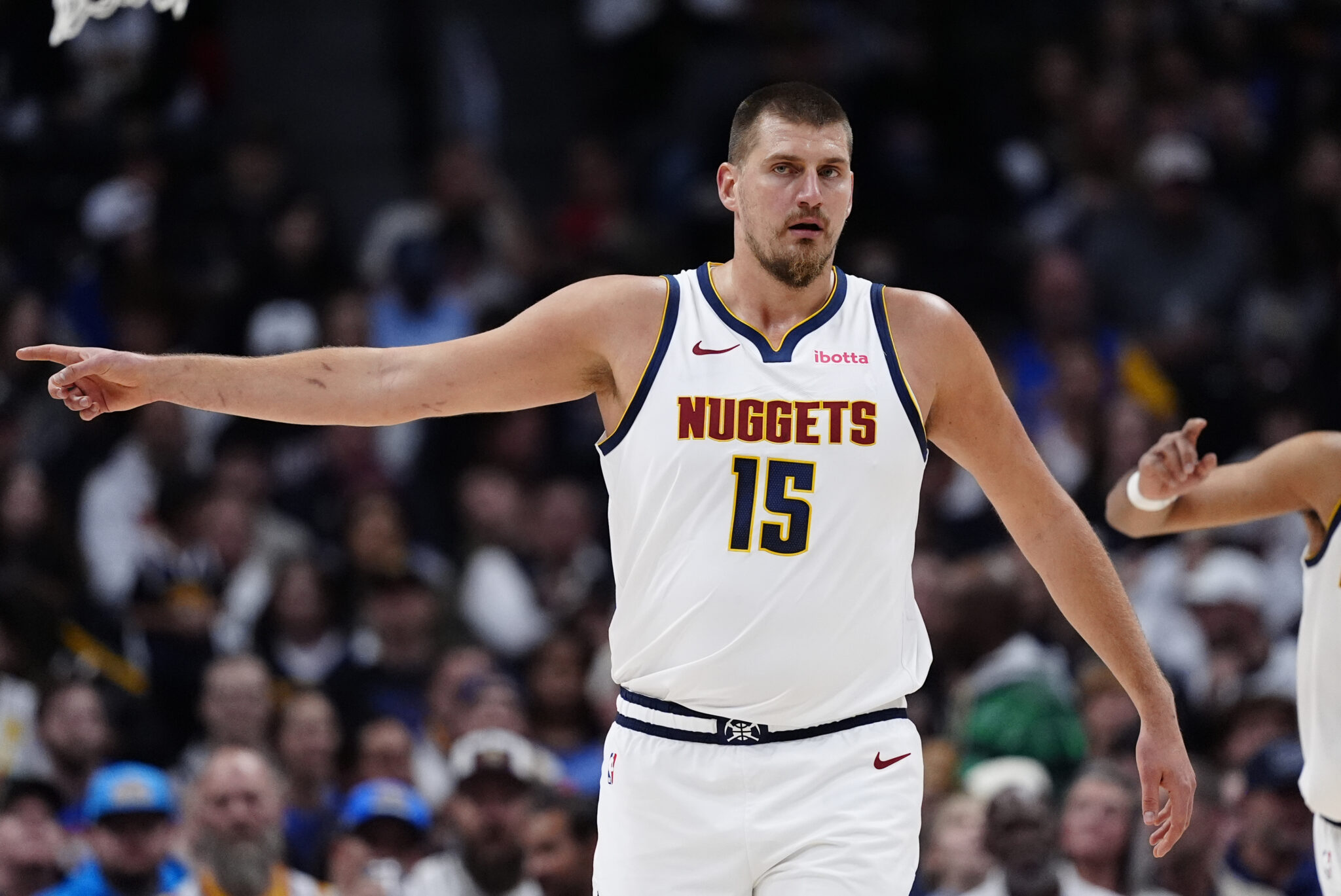 Nov 5, 2025; Denver, Colorado, USA; Denver Nuggets center Nikola Jokic (15) during the first quarter against the Miami Heat at Ball Arena. Mandatory Credit: Ron Chenoy-Imagn Images