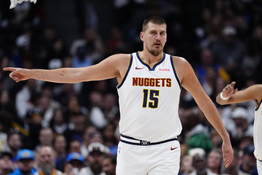 Nov 5, 2025; Denver, Colorado, USA; Denver Nuggets center Nikola Jokic (15) during the first quarter against the Miami Heat at Ball Arena. Mandatory Credit: Ron Chenoy-Imagn Images