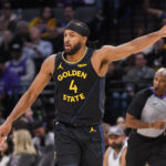Nov 5, 2025; Sacramento, California, USA; Golden State Warriors guard Moses Moody (4) reacts after scoring against the Sacramento Kings during the second quarter at Golden 1 Center. Mandatory Credit: Ed Szczepanski-Imagn Images
