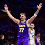 Nov 5, 2025; Los Angeles, California, USA; Los Angeles Lakers guard Luka Doncic (77) reacts after scoring a basket against the San Antonio Spurs during the first half at Crypto.com Arena. Mandatory Credit: Gary A. Vasquez-Imagn Images